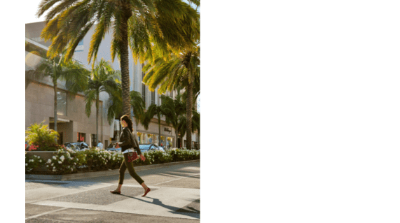 A Woman crossing Rodeo Drive